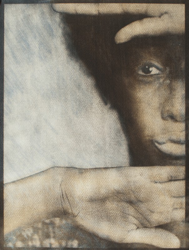 Portrait between hands